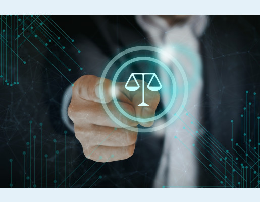 Mano señalando el icono de una balanza, símbolo de la justicia