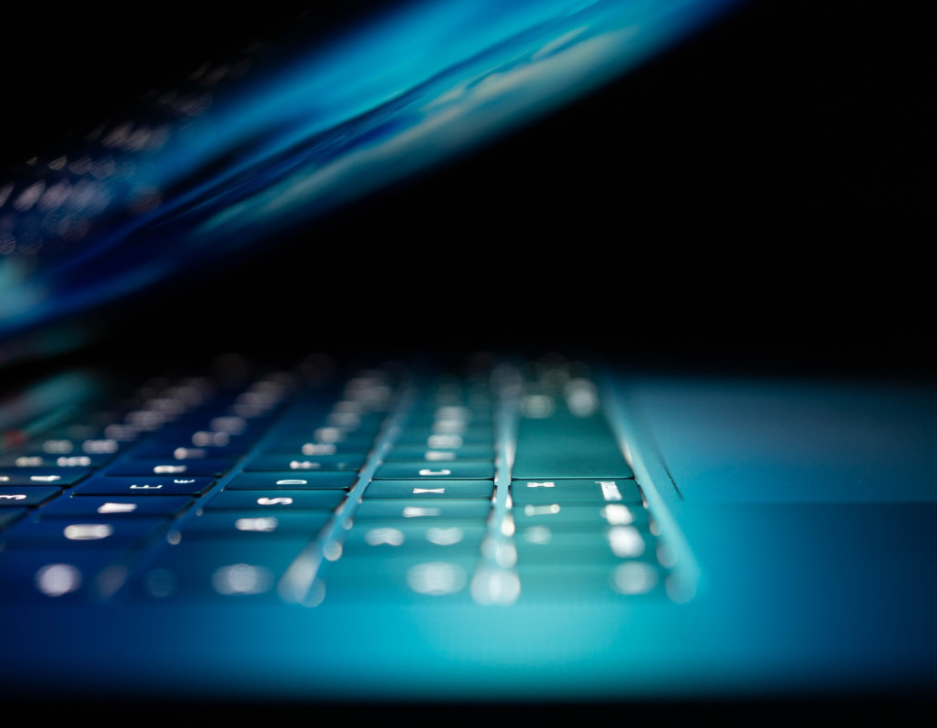 Teclado retroiluminado de ordenador portátil